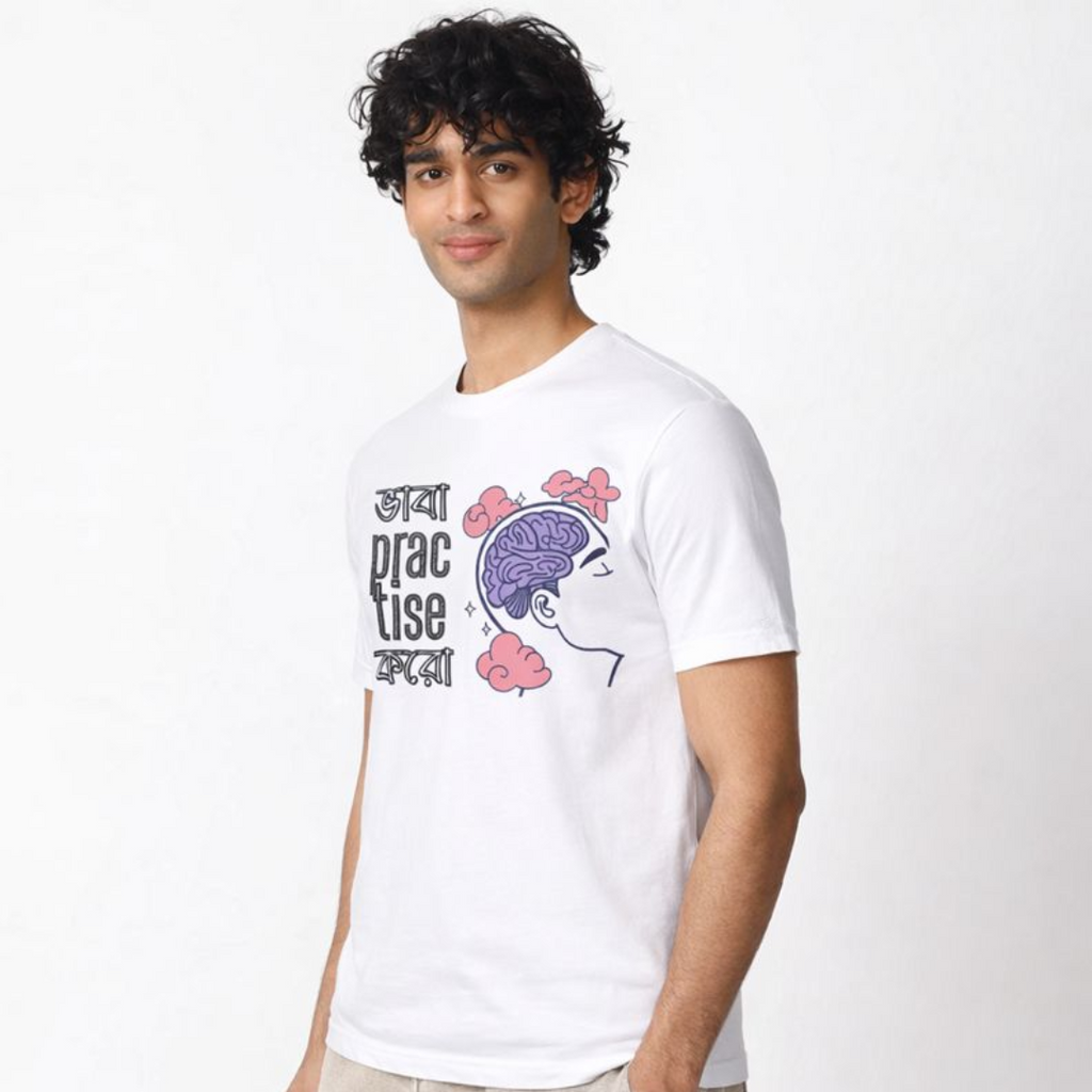 Person wearing a white t-shirt with a graphic design on a white background