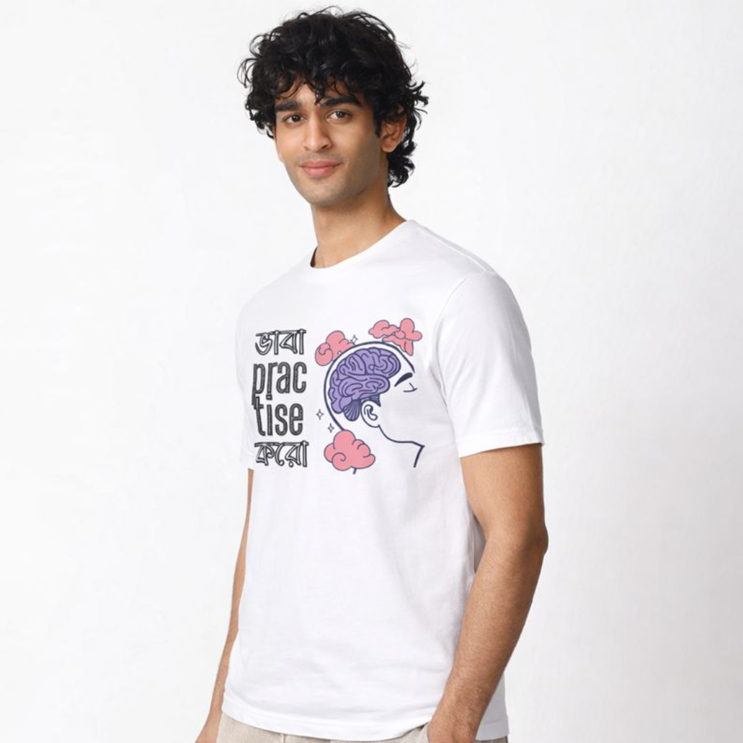 Person wearing a white t-shirt with a graphic design on a white background